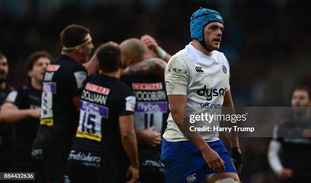 Zach Mercer of Bath Rugby reacts as Thomas Waldrom of Exeter Chiefs celebrates his sides fifth try during the Aviva Premiership match between Exeter...