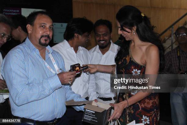 Bollywood actor Pooja Bedi distributing Condom packs on the occasion of World AIDS Day, on December 1, 2017 in Mumbai, India. World AIDS Day,...