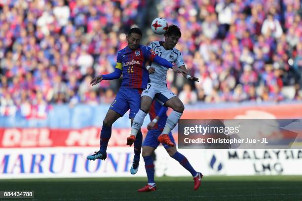 Yuhei Tokunaga of FC Tokyo and Akito Takagi of Gamba Osaka compete for the ball during the J.League J1 match between FC Tokyo and Gamba Osaka at...