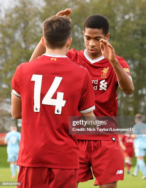 Adam Lewis of Liverpool celebrates scoring his second goal from the penalty spot with team mate Elijah Dixon-Bonner during the Liverpool v Sunderland...