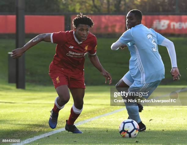 Yasser Larouci of Liverpool and Williams Kokolo of Sunderland in action during the Liverpool v Sunderland U18 Premier League Cup game at The Kirkby...