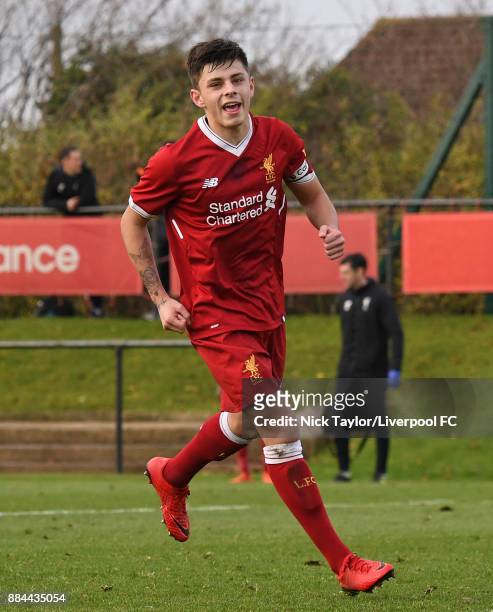 Adam Lewis of Liverpool celebrates scoring his second goal from the penalty spot during the Liverpool v Sunderland U18 Premier League Cup game at The...