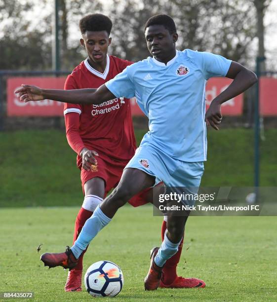 Abdi Sharif of Liverpool and Benji Kimpioka of Sunderland in action during the Liverpool v Sunderland U18 Premier League Cup game at The Kirkby...