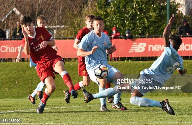 Anthony Glennon of Liverpool and Bali Mumba of Sunderland in action during the Liverpool v Sunderland U18 Premier League Cup game at The Kirkby...