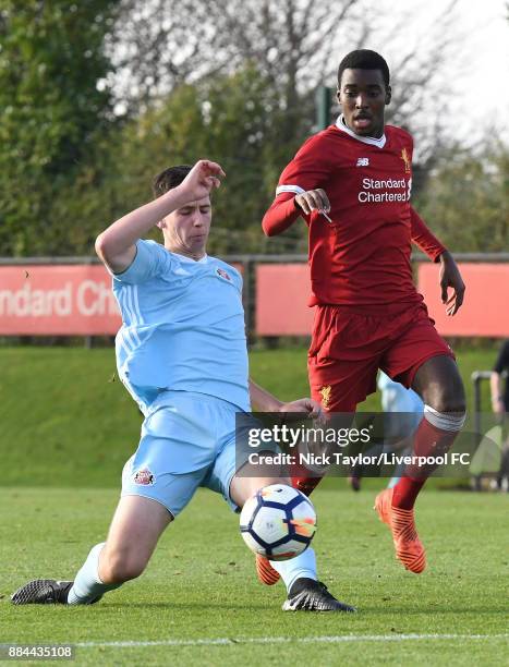 Rafael Camacho of Liverpool and Jacob Young of Sunderland in action during the Liverpool v Sunderland U18 Premier League Cup game at The Kirkby...