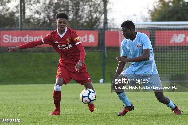 Abdi Sharif of Liverpool and Benji Kimpioka of Sunderland in action during the Liverpool v Sunderland U18 Premier League Cup game at The Kirkby...