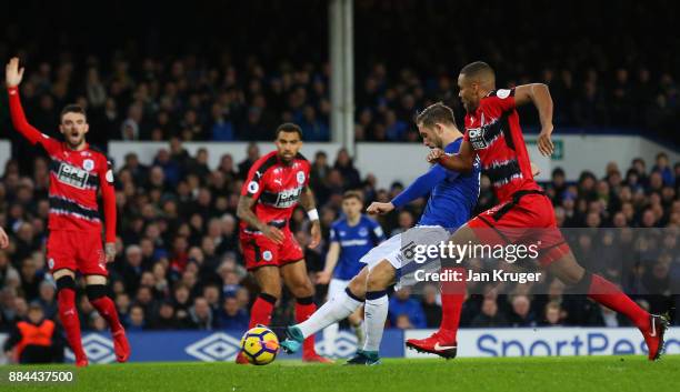 Gylfi Sigurdsson of Everton scores his sides first goal during the Premier League match between Everton and Huddersfield Town at Goodison Park on...