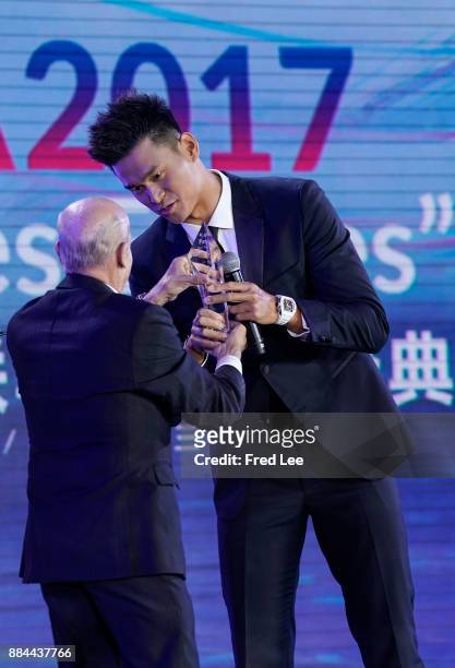 President Julio Cesar Maglione and Chinese swimmer Sun Yang attend the 2017 FINA/Alisports World Aquatics Gala "Soiree des Etoiles"on December 2,...