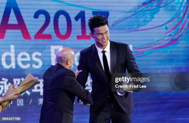 President Julio Cesar Maglione and Chinese swimmer Sun Yang attend the 2017 FINA/Alisports World Aquatics Gala "Soiree des Etoiles"on December 2,...