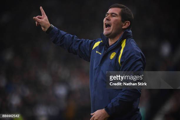 Nigel Clough manager of Burton Albion gives his players instructions during the Sky Bet Championship match between Derby County and Burton Albion at...