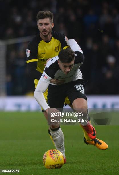 Tom Lawrence of Derby County and Luke Murphy of Burton Albion in action during the Sky Bet Championship match between Derby County and Burton Albion...