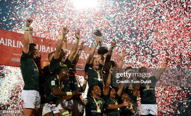 Players of South Africa pose for photos with the trophy after winning the Cup Final match between South Africa and New Zealand on Day Three of the...