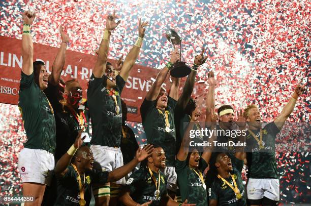 Players of South Africa pose for photos with the trophy after winning the Cup Final match between South Africa and New Zealand on Day Three of the...