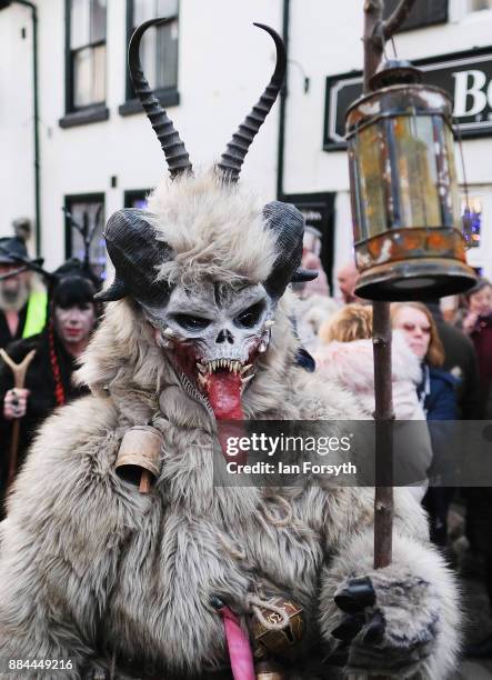 Participants take part in the Whitby Krampus parade on December 2, 2017 in Whitby, England. The Krampus is a horned, anthropomorphic figure from...