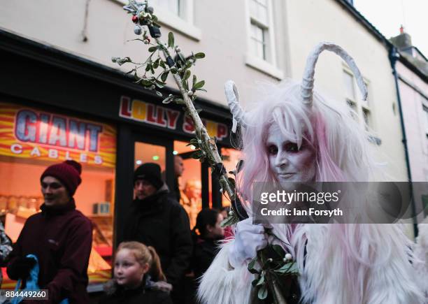 Participants take part in the Whitby Krampus parade on December 2, 2017 in Whitby, England. The Krampus is a horned, anthropomorphic figure from...