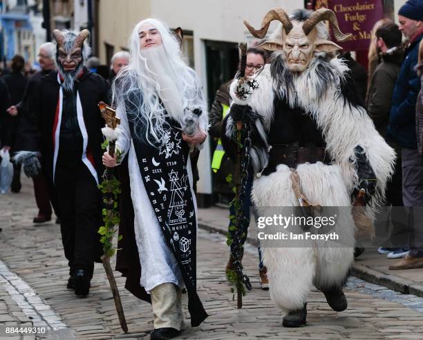 Participants take part in the Whitby Krampus parade on December 2, 2017 in Whitby, England. The Krampus is a horned, anthropomorphic figure from...