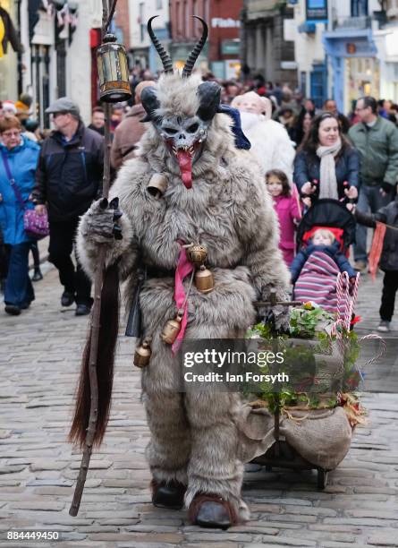 Participants take part in the Whitby Krampus parade on December 2, 2017 in Whitby, England. The Krampus is a horned, anthropomorphic figure from...