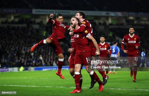 Jordan Henderson of Liverpool celebrates after his team mate Philippe Coutinho of Liverpool scored his sides fourth goal during the Premier League...