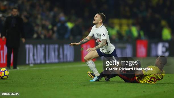 Marvin Zeegelaar of Watford fouls Kieran Trippier of Tottenham Hotspur during the Premier League match between Watford and Tottenham Hotspur at...