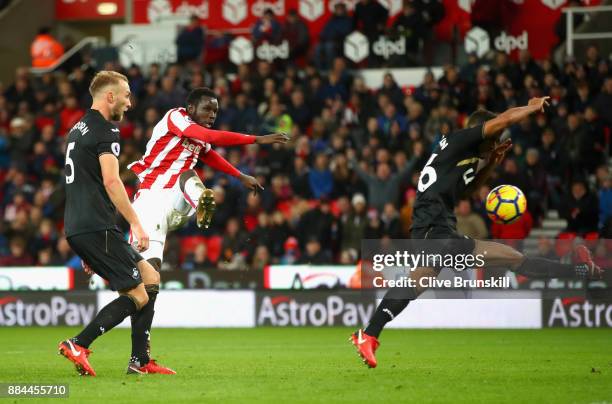 Mame Biram Diouf of Stoke City scores his sides second goal during the Premier League match between Stoke City and Swansea City at Bet365 Stadium on...