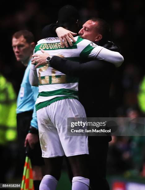 Odsonne Edouard of Celtic celebrates with Celtic manager Brendan Rodgers after he scores his third goal to complete a hat-trick during the Ladbrokes...