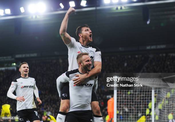 Johnny Russell of Derby County celebrates with Chris Martin after he scores during the Sky Bet Championship match between Derby County and Burton...