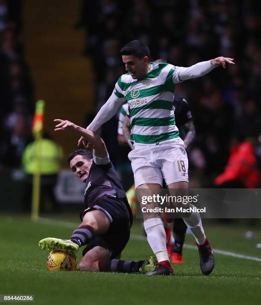 Carl McHugh of Motherwell vies with Tomas Rogic of Celtic during the Ladbrokes Scottish Premiership match between Celtic and Motherwell at Celtic...