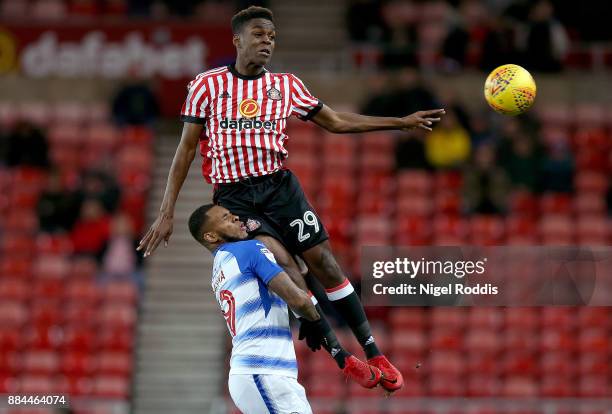 Joel Asoro of Sunderland challenged by Leandro Bacuna of Reading during the Sky Bet Championship match between Sunderland and Reading at Stadium of...