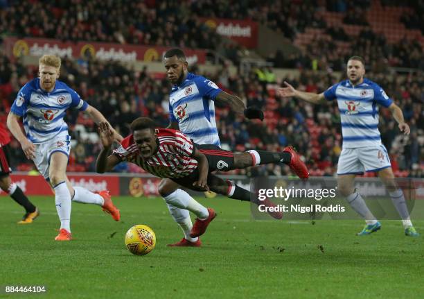 Joel Asoro of Sunderland is fouled for a penalty by Leandro Bacuna of Reading during the Sky Bet Championship match between Sunderland and Reading at...