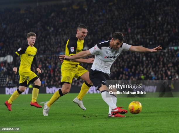Chris Martin of Derby County shoots at goal during the Sky Bet Championship match between Derby County and Burton Albion at iPro Stadium on December...
