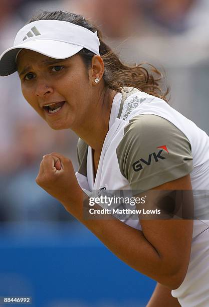 Sania Mirza of India celebrates her win against Melinda Czink of Hungary during day five of the AEGON Classic at the Edgbaston Priory Club on June...