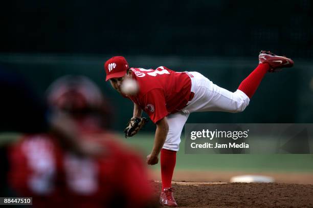 Roberto Ramirez of Mexico's Diablos Rojos pitches during their game against Chihuahua's Dorados valid for Mexican BaseBall League 2009 at Foro Sol on...