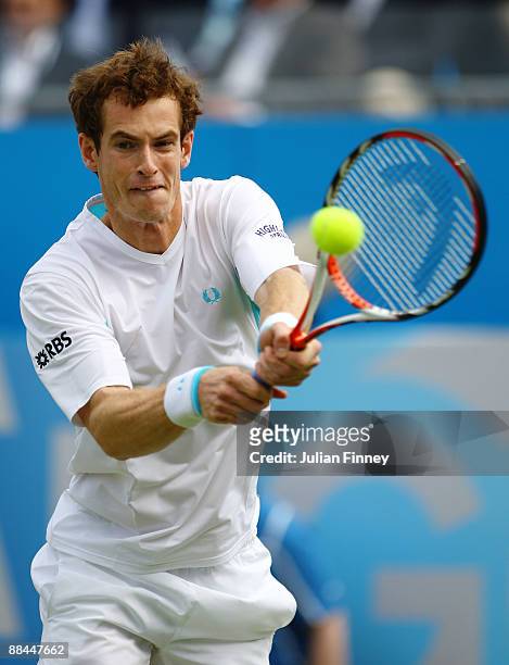 Andy Murray of Great Britain plays a backhand during the men's quarter final match against Mardy Fish of USA during Day 5 of the the AEGON...
