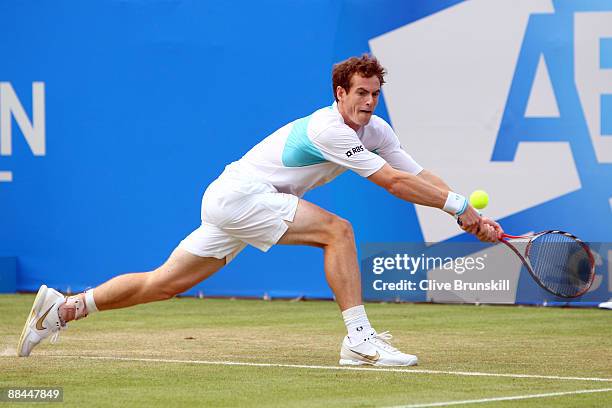 Andy Murray of Great Britain plays a backhand during the men's quarter final match against Mardy Fish of USA during Day 5 of the the AEGON...