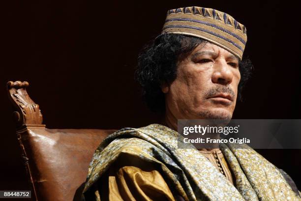 Lybia's Leader Muammar Gaddafi attends a meeting with seven hundred Italian women at the Auditorium Parco Della Musica on June 12, 2009 in Rome,...