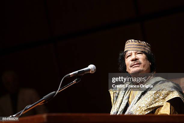 Lybia's Leader Muammar Gaddafi attends a meeting with seven hundred Italian women at the Auditorium Parco Della Musica on June 12, 2009 in Rome,...