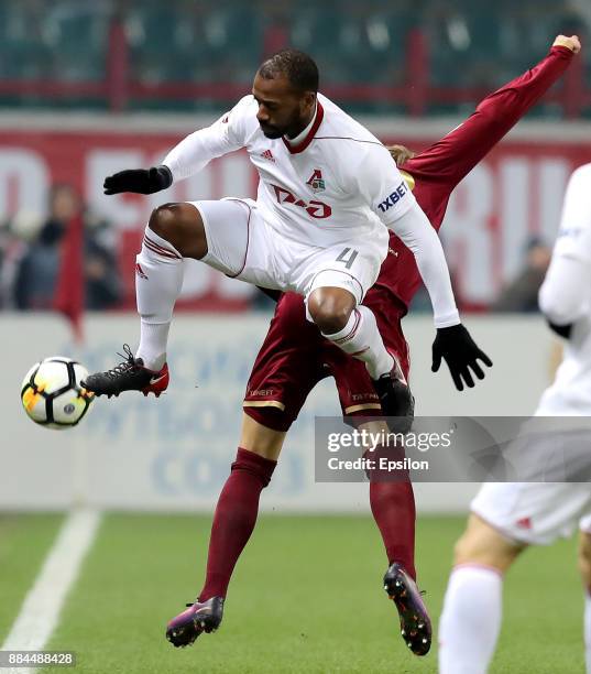 Manuel Fernandes of FC Lokomotiv Moscow vies for the ball with Moritz Bauer of FC Rubin Kazan during the Russian Premier League match between FC...