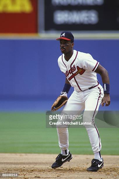 Fred McGriff of the Atlanta Braves prepares for a ground ball during a baseball game against the Colorado Rockies on June 1, 1994 at Fulton County...