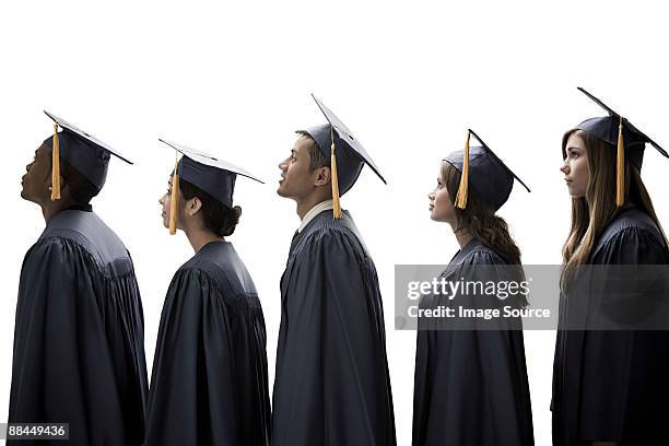 graduates - toga fotografías e imágenes de stock