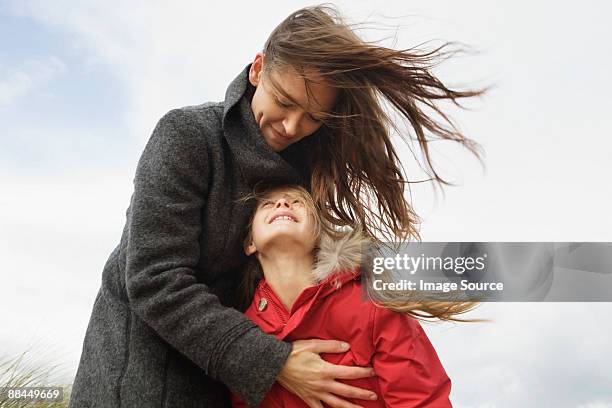 mother and daughter outdoors - hair love stock pictures, royalty-free photos & images