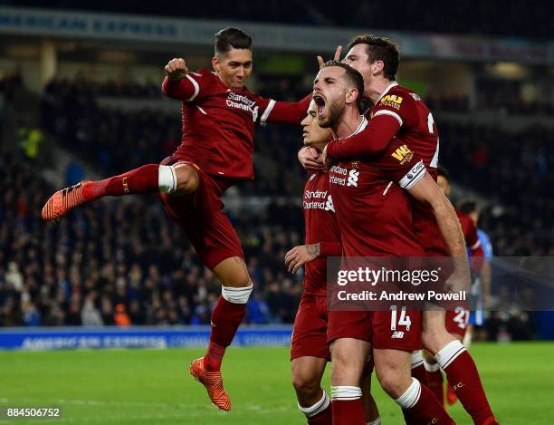 Philippe Coutinho of Liverpool celebrates after scoring during the Premier League match between Brighton and Hove Albion and Liverpool at Amex...
