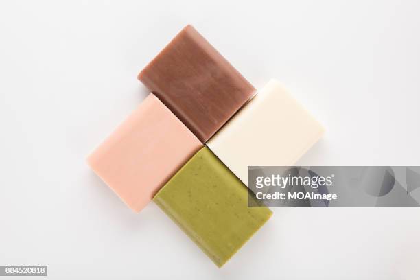 four colour soaps - seifenstück stock-fotos und bilder