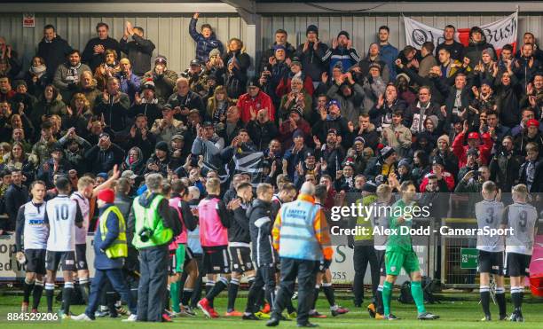 The Hereford team celebrate with their fans after the match during the Sky Bet League One match between Fleetwood Town and Peterborough United at...