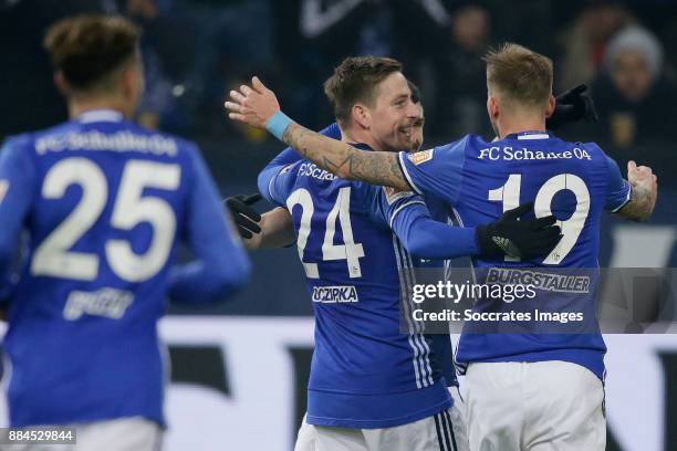 Guido Burgstaller of Schalke 04 celebrates 1-0 with Bastian Oczipka of Schalke 04 during the German Bundesliga match between Schalke 04 v 1. FC Koln...