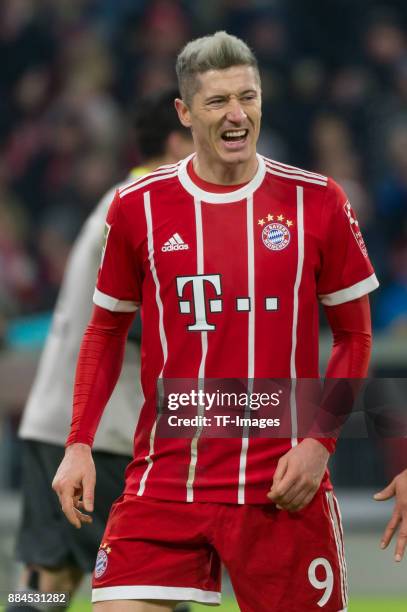 Robert Lewandowski of Bayern Muenchen looks angry during the Bundesliga match between FC Bayern Muenchen and Hannover 96 at Allianz Arena on December...