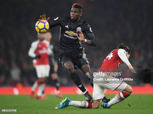 Paul Pogba of Manchester United stamps on Hector Bellerin of Arsenal and is later sent off for the challenge during the Premier League match between...