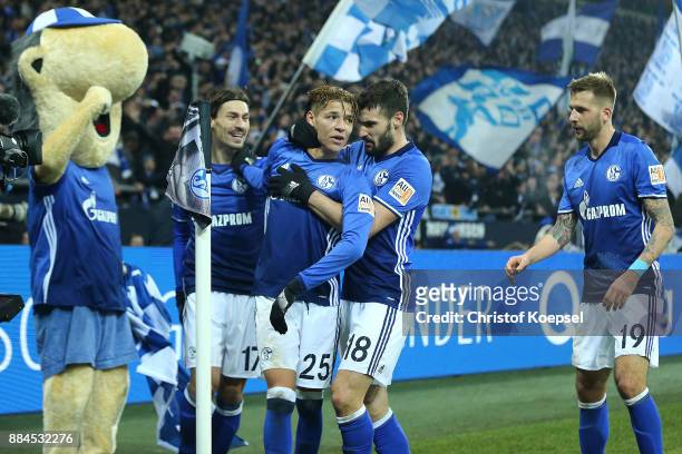 Amine Harit of Schalke celebrates after he scored a goal to make it 2:1 during the Bundesliga match between FC Schalke 04 and 1. FC Koeln at...