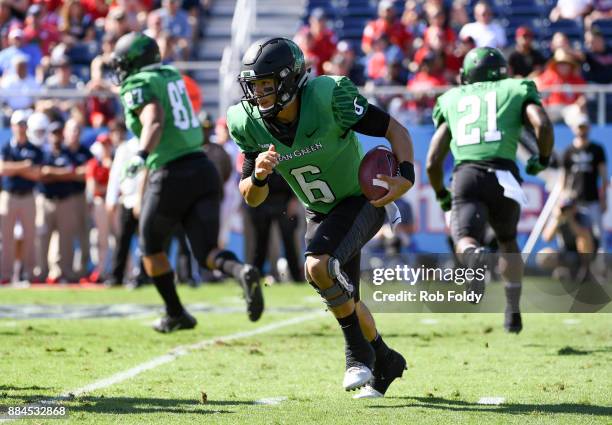 Mason Fine of the North Texas Mean Green carries during the Conference USA Championship game against the Florida Atlantic Owls at FAU Stadium on...