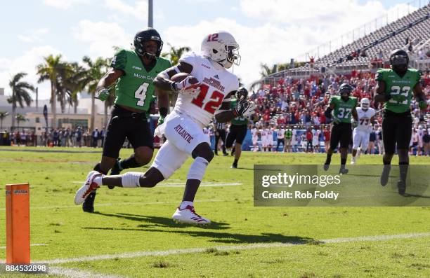 John Franklin III of the Florida Atlantic Owls scores a touchdown during the first half of the Conference USA Championship game against the North...