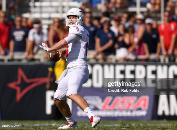 Jason Driskel of the Florida Atlantic Owls sets to throw during the Conference USA Championship game against the North Texas Mean Green at FAU...